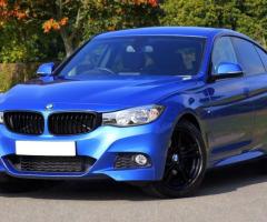 A super blue BMW car is for sale , very low price and good looking